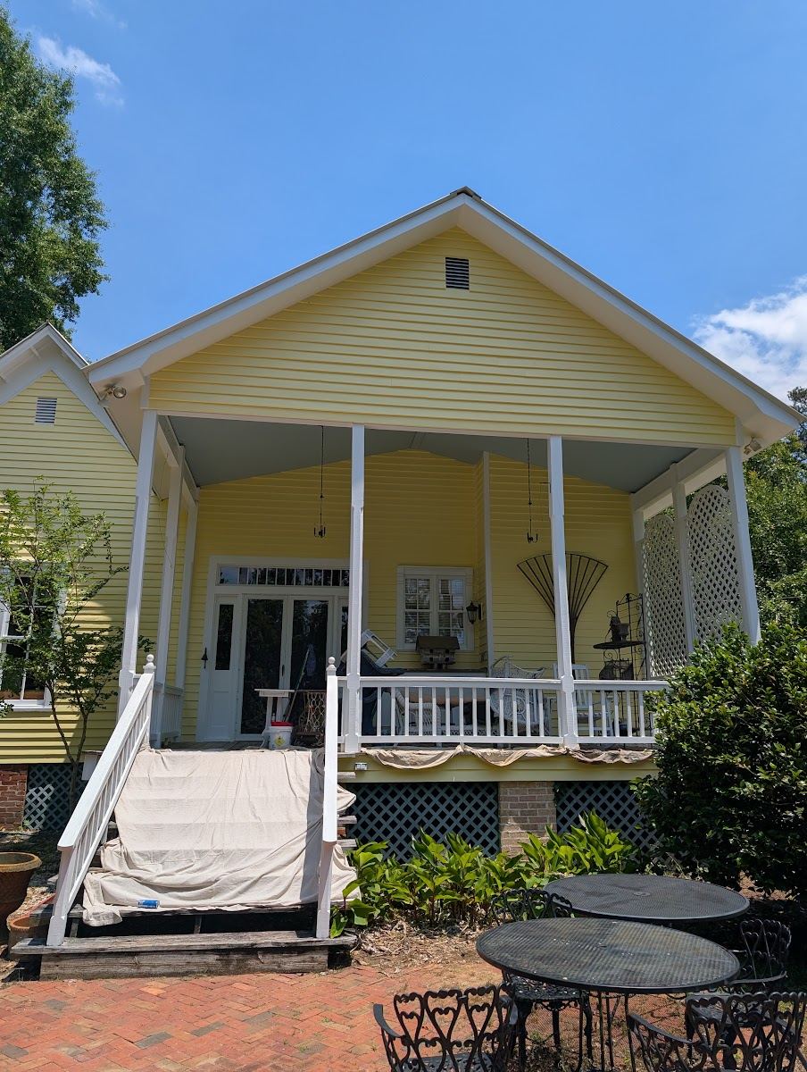 Yellow house porch